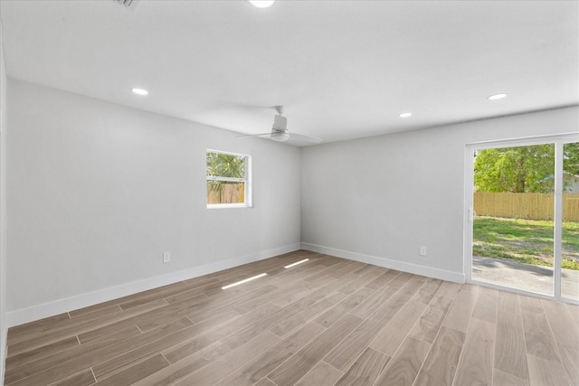unfurnished room featuring light wood-style floors, baseboards, recessed lighting, and ceiling fan