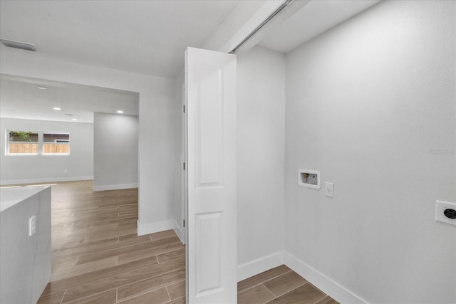 clothes washing area featuring hookup for an electric dryer, washer hookup, baseboards, and recessed lighting