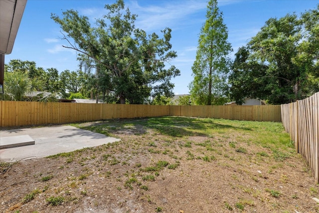 fenced backyard featuring a patio area