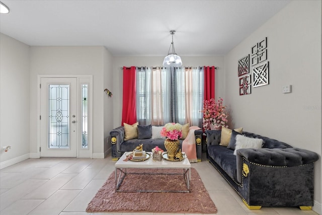 19212 Sunlake Blvd, Lutz, FL 33558 - living area featuring plenty of natural light, light tile patterned floors, and baseboards