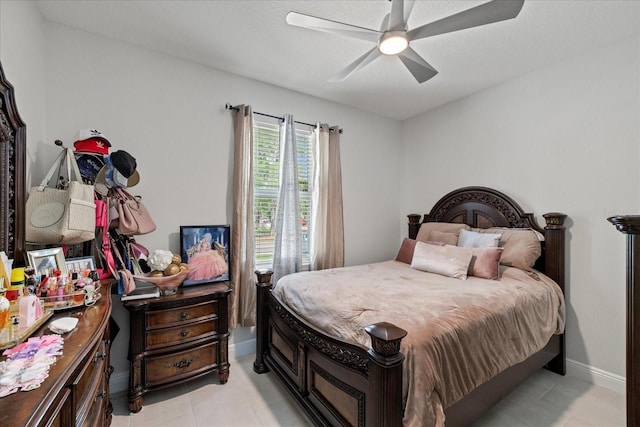 19212 Sunlake Blvd, Lutz, FL 33558 - bedroom with light tile patterned flooring, baseboards, and ceiling fan