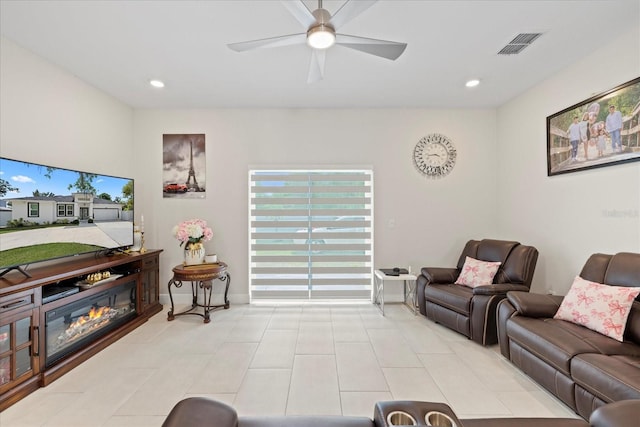 19212 Sunlake Blvd, Lutz, FL 33558 - living room featuring ceiling fan, plenty of natural light, recessed lighting, and baseboards
