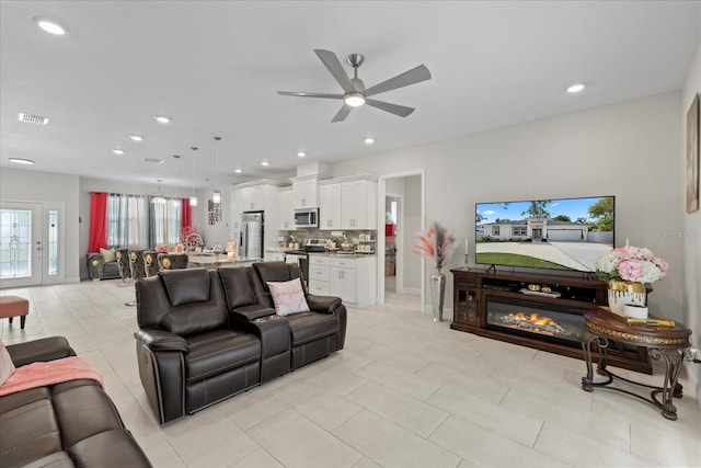 19212 Sunlake Blvd, Lutz, FL 33558 - living room featuring ceiling fan and recessed lighting