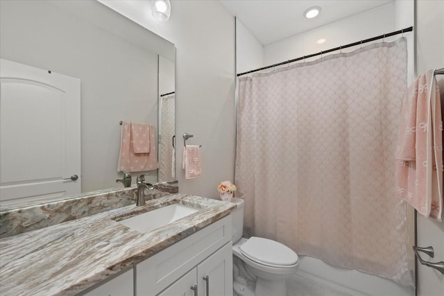 19212 Sunlake Blvd, Lutz, FL 33558 - bathroom with toilet, vanity, and shower / bath combo with shower curtain