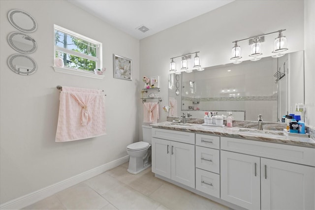 19212 Sunlake Blvd, Lutz, FL 33558 - full bath with tile patterned flooring, walk in shower, double vanity, baseboards, and toilet