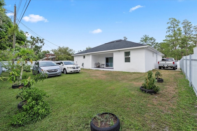 19212 Sunlake Blvd, Lutz, FL 33558 - rear view of house featuring stucco siding and a shingled roof