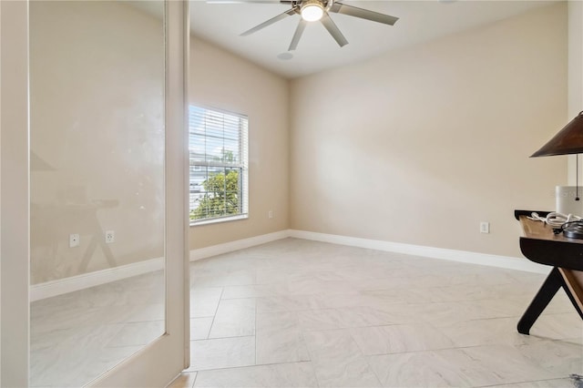 2262 Lune Ct, Melbourne, FL 32904 - unfurnished office with a ceiling fan, baseboards, and light marble finish flooring