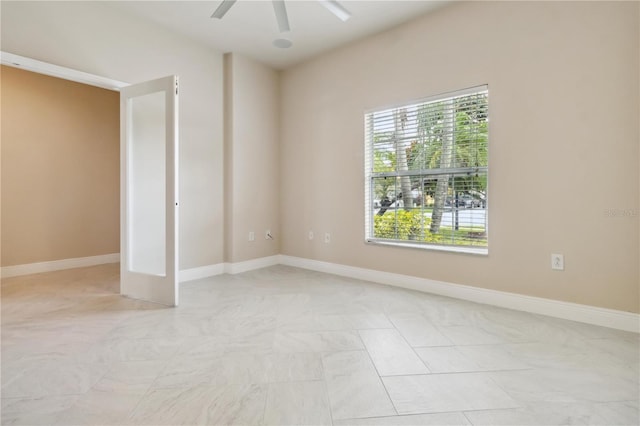 2262 Lune Ct, Melbourne, FL 32904 - spare room featuring ceiling fan and baseboards