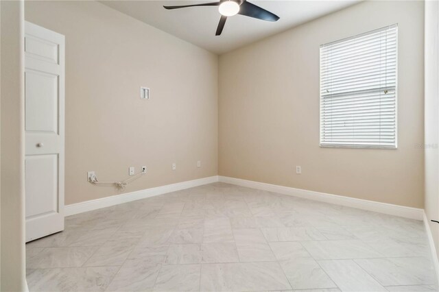 2262 Lune Ct, Melbourne, FL 32904 - spare room with a ceiling fan and baseboards