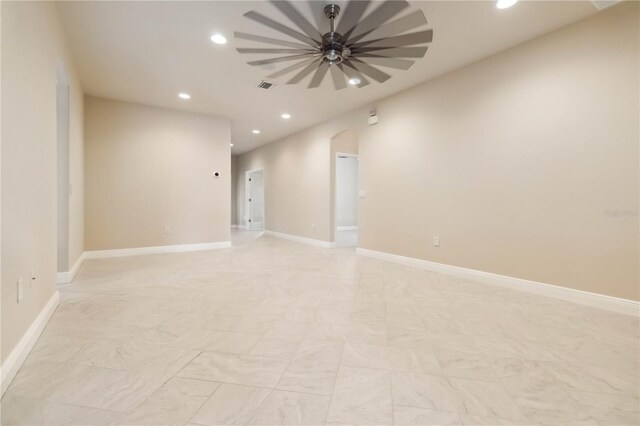 2262 Lune Ct, Melbourne, FL 32904 - empty room featuring recessed lighting, baseboards, a ceiling fan, and arched walkways