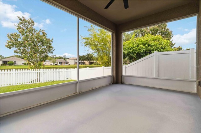 2262 Lune Ct, Melbourne, FL 32904 - unfurnished sunroom featuring a ceiling fan, a water view, and a residential view