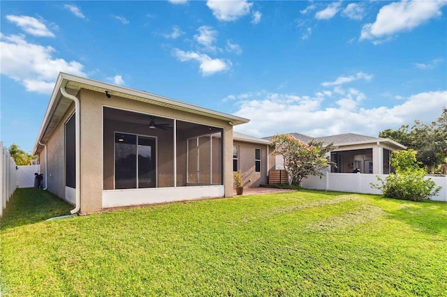 2262 Lune Ct, Melbourne, FL 32904 - rear view of property with a sunroom, stucco siding, and ceiling fan