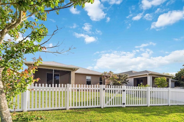 2262 Lune Ct, Melbourne, FL 32904 - view of front of home featuring a sunroom and stucco siding