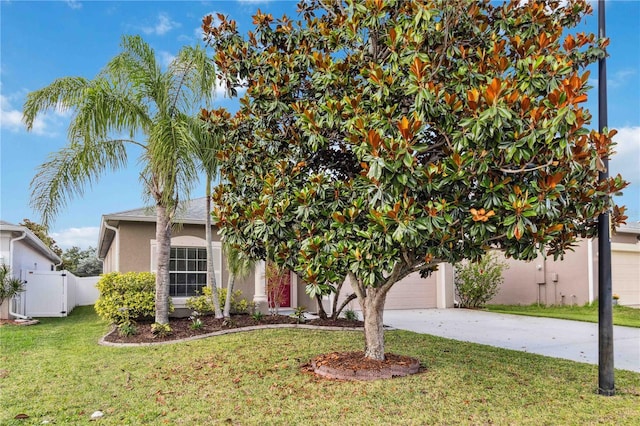 2262 Lune Ct, Melbourne, FL 32904 - obstructed view of property with stucco siding and driveway