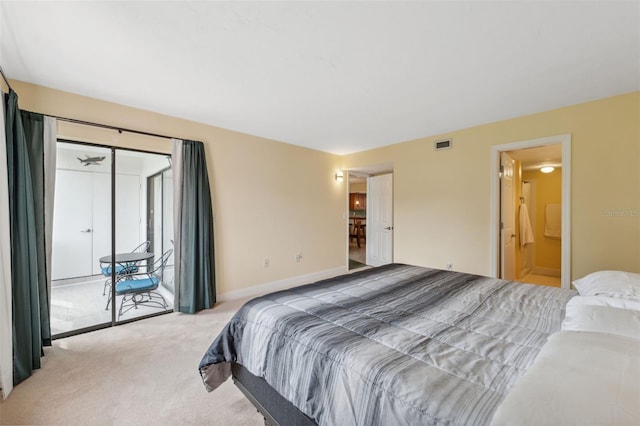 143 Lakeside Dr Unit 143, Oldsmar, FL 34677 - bedroom featuring access to outside and carpet