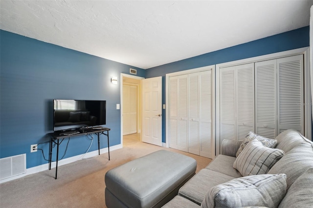 143 Lakeside Dr Unit 143, Oldsmar, FL 34677 - carpeted living area featuring baseboards