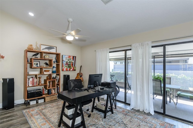 322 Windrush Loop Unit 22, Tarpon Springs, FL 34689 - office space with ceiling fan, light wood-style flooring, vaulted ceiling, and baseboards