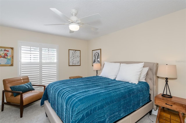 322 Windrush Loop Unit 22, Tarpon Springs, FL 34689 - bedroom with carpet flooring and a ceiling fan