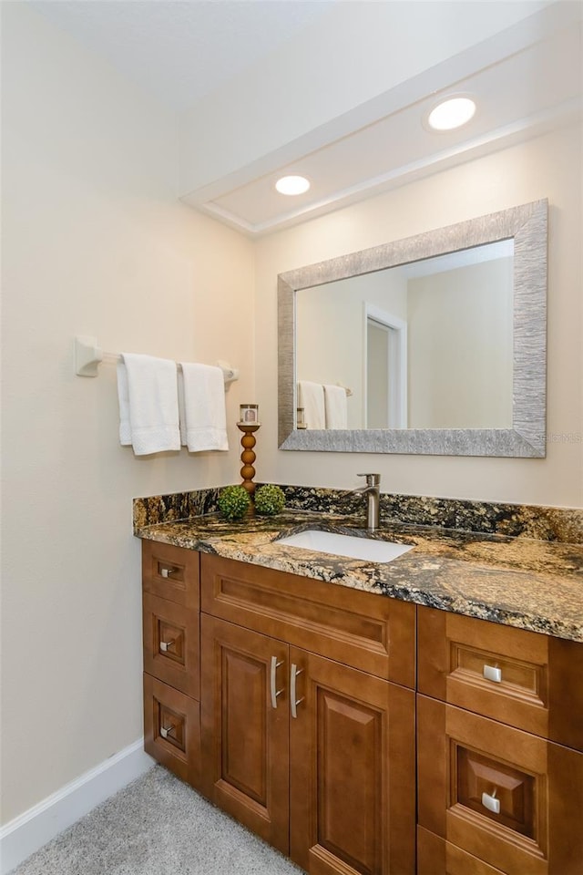 322 Windrush Loop Unit 22, Tarpon Springs, FL 34689 - bathroom with vanity, baseboards, and recessed lighting