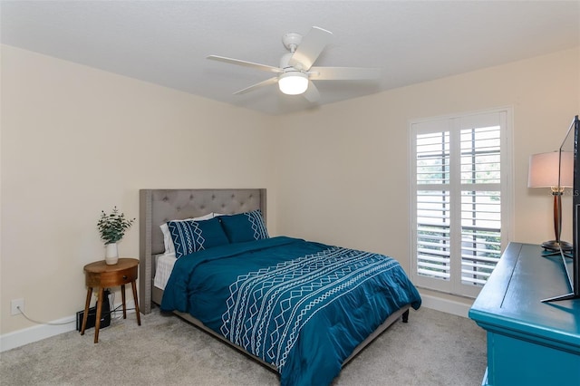322 Windrush Loop Unit 22, Tarpon Springs, FL 34689 - bedroom with carpet, multiple windows, and baseboards
