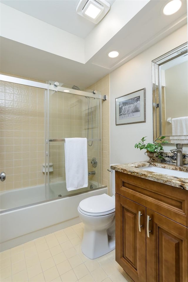 322 Windrush Loop Unit 22, Tarpon Springs, FL 34689 - full bathroom with vanity, toilet, tile patterned floors, shower / bath combination with glass door, and recessed lighting