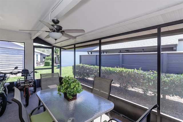 322 Windrush Loop Unit 22, Tarpon Springs, FL 34689 - sunroom with ceiling fan and outdoor dining area