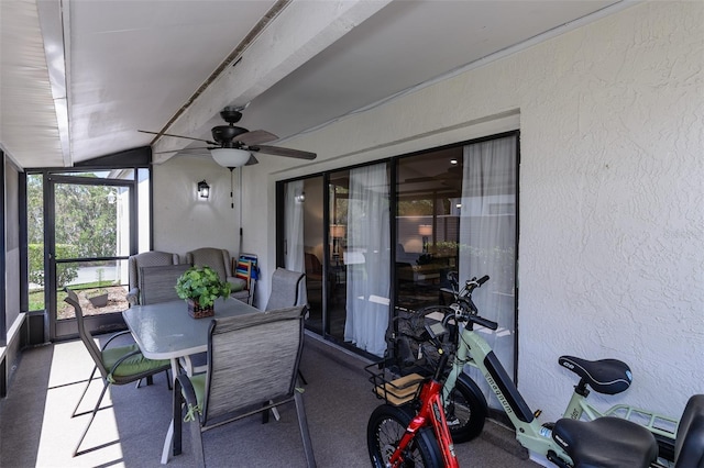 322 Windrush Loop Unit 22, Tarpon Springs, FL 34689 - sunroom / solarium featuring ceiling fan, lofted ceiling, and outdoor dining space