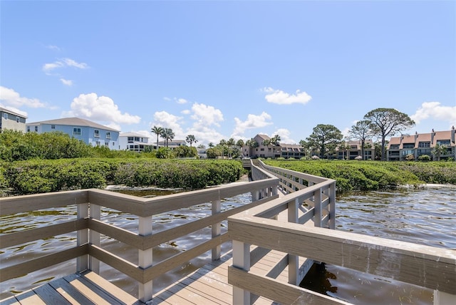 322 Windrush Loop Unit 22, Tarpon Springs, FL 34689 - dock featuring a residential view and a water view