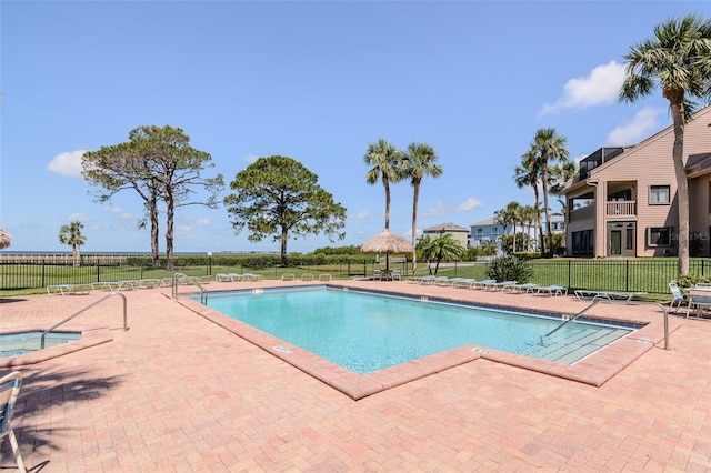 322 Windrush Loop Unit 22, Tarpon Springs, FL 34689 - community pool featuring a patio area and a gazebo