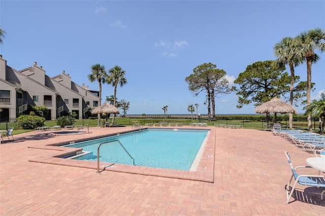 322 Windrush Loop Unit 22, Tarpon Springs, FL 34689 - community pool featuring a gazebo and a patio area