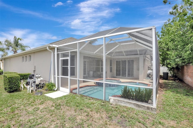 13708 Old Dock Rd, Orlando, FL 32828 - back of house featuring stucco siding, a pool with connected hot tub, a patio, and glass enclosure