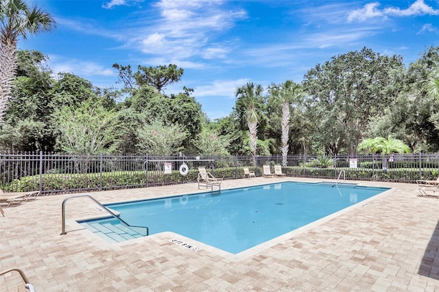 13708 Old Dock Rd, Orlando, FL 32828 - community pool featuring fence and a patio area