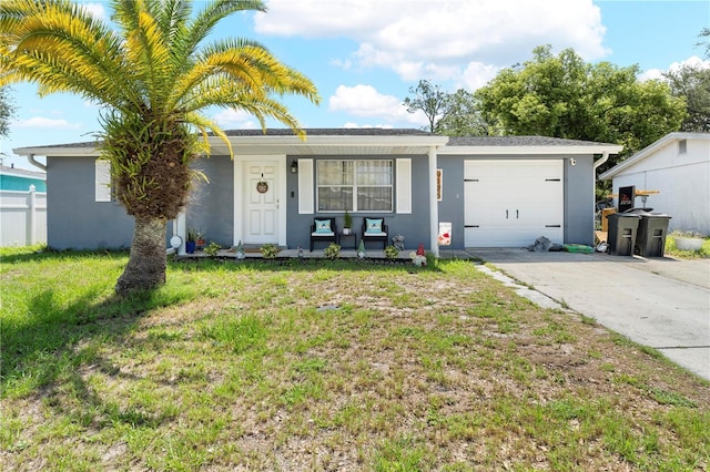 9126 Greenbriar Ln, Port Richey, FL 34668 - ranch-style home with covered porch, driveway, stucco siding, and a garage