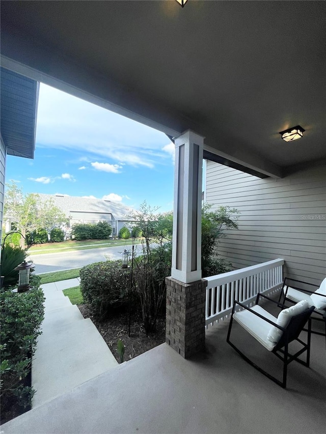 2244 NW 101st St, Gainesville, FL 32606 - view of patio featuring a porch
