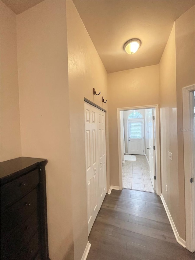 2244 NW 101st St, Gainesville, FL 32606 - hall featuring dark wood-style floors and baseboards