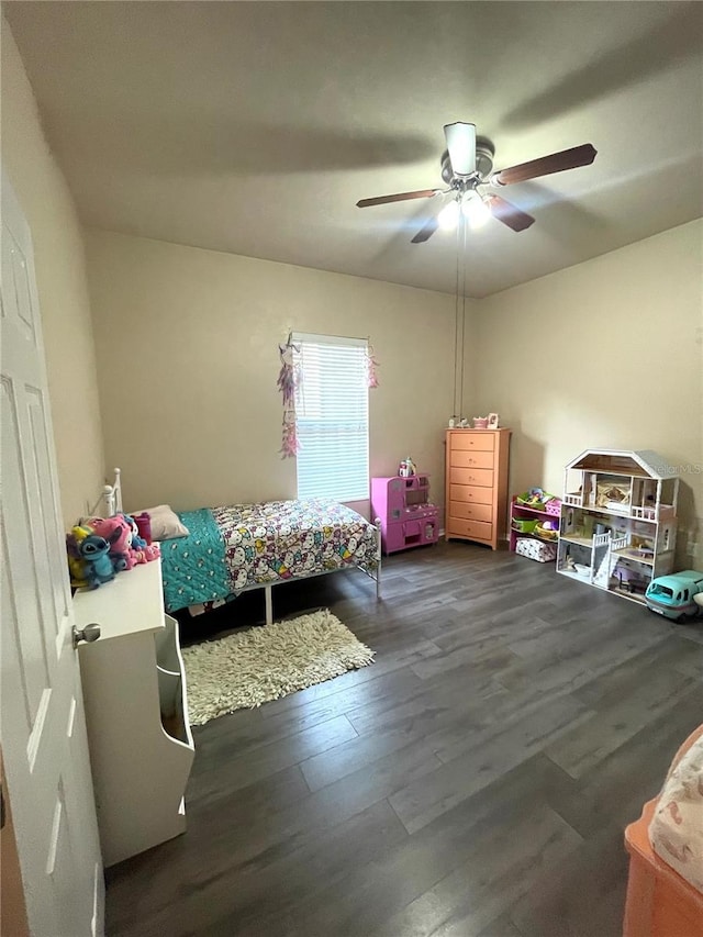 2244 NW 101st St, Gainesville, FL 32606 - bedroom with wood finished floors and ceiling fan