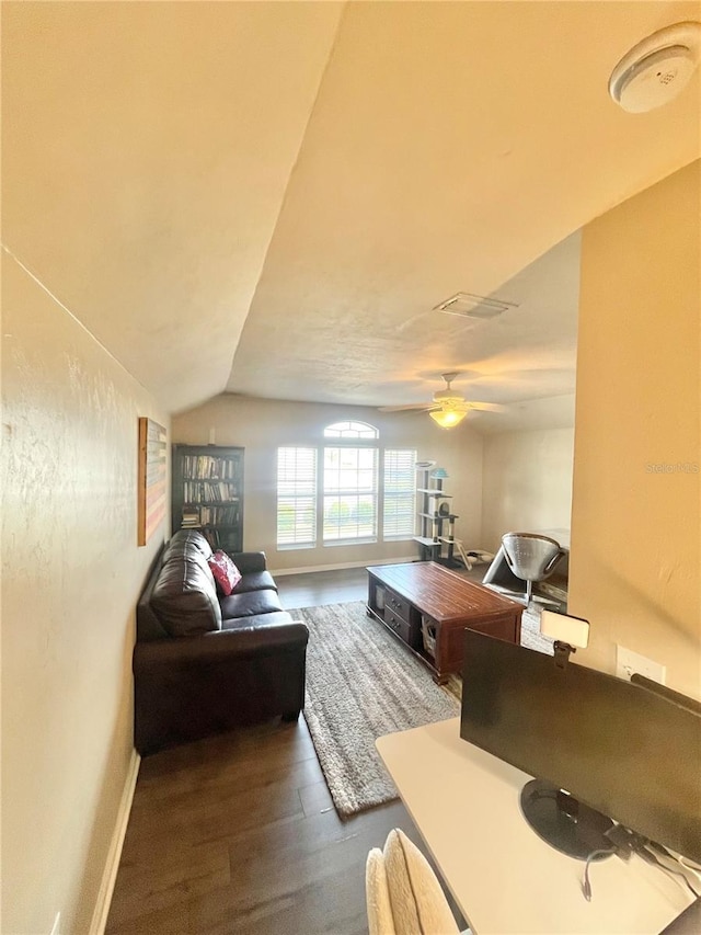 2244 NW 101st St, Gainesville, FL 32606 - living area with wood finished floors, baseboards, ceiling fan, and vaulted ceiling
