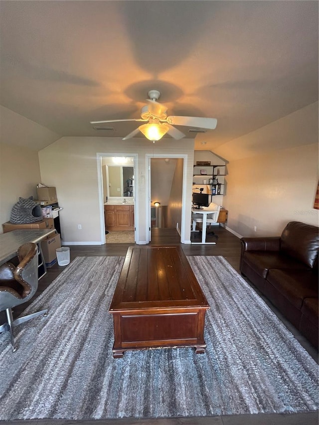 2244 NW 101st St, Gainesville, FL 32606 - living area with lofted ceiling, baseboards, a ceiling fan, and wood finished floors