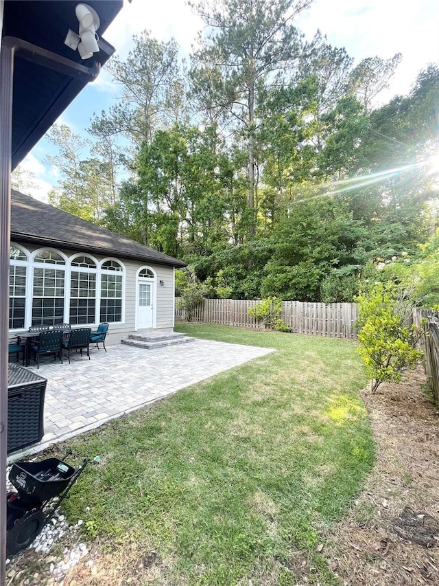 2244 NW 101st St, Gainesville, FL 32606 - view of yard with a patio