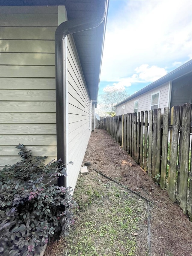 2244 NW 101st St, Gainesville, FL 32606 - view of side of home with fence