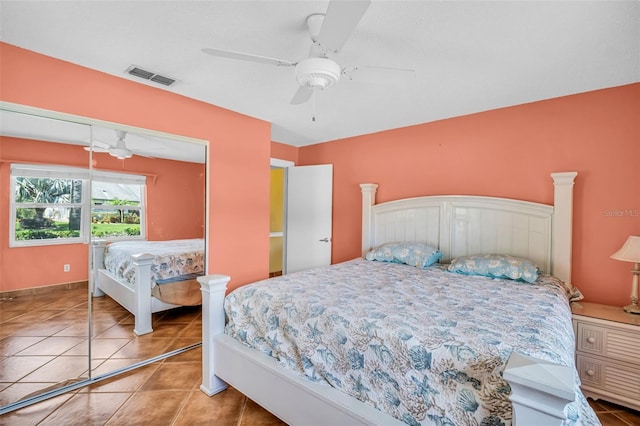3224 Hilary Cir, Palm Harbor, FL 34684 - bedroom with tile patterned flooring and a ceiling fan