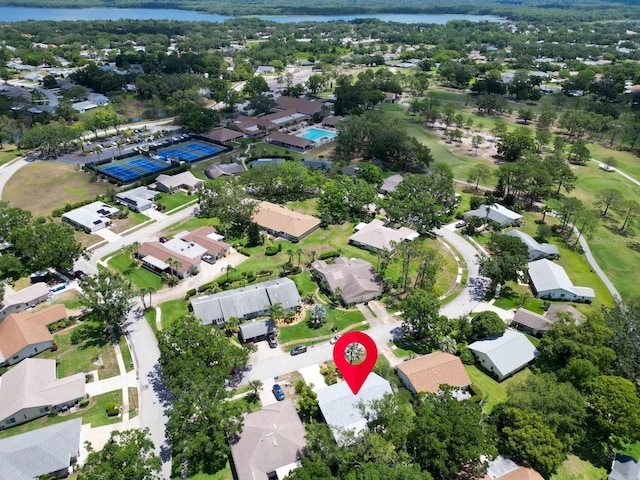 3224 Hilary Cir, Palm Harbor, FL 34684 - aerial view of property and surrounding area with a nearby body of water, nearby suburban area, and a golf club