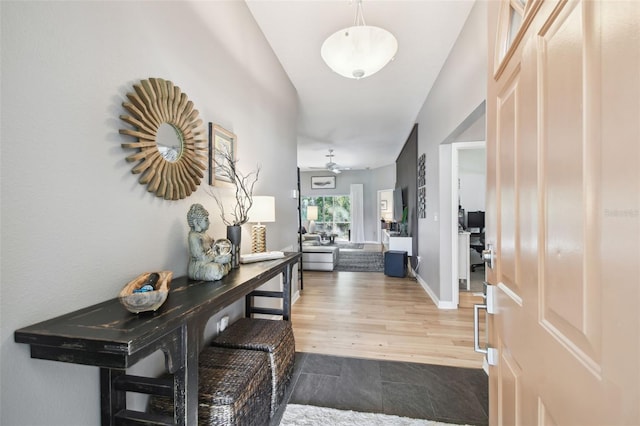 11446 Sinatra Ct, New Port Richey, FL 34654 - entrance foyer with a ceiling fan and wood finished floors
