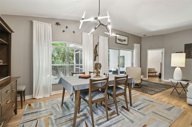 11446 Sinatra Ct, New Port Richey, FL 34654 - dining area with light wood finished floors