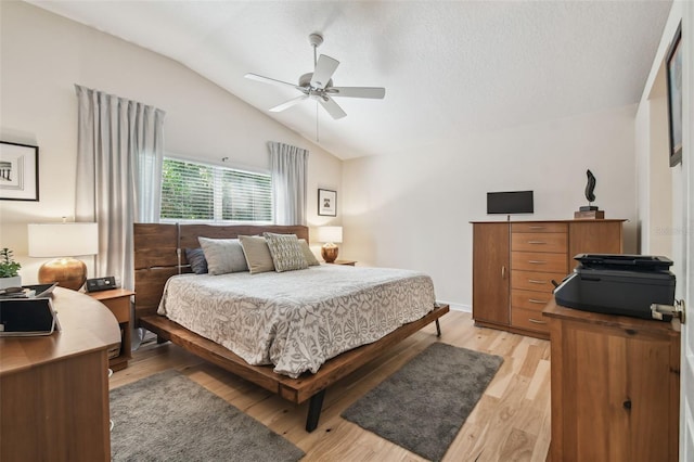 11446 Sinatra Ct, New Port Richey, FL 34654 - bedroom with lofted ceiling, light wood-type flooring, an office area, and a ceiling fan