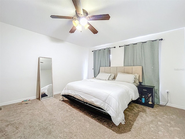 4732 Ashburn Pond Way, Tampa, FL 33610 - carpeted bedroom with baseboards and ceiling fan