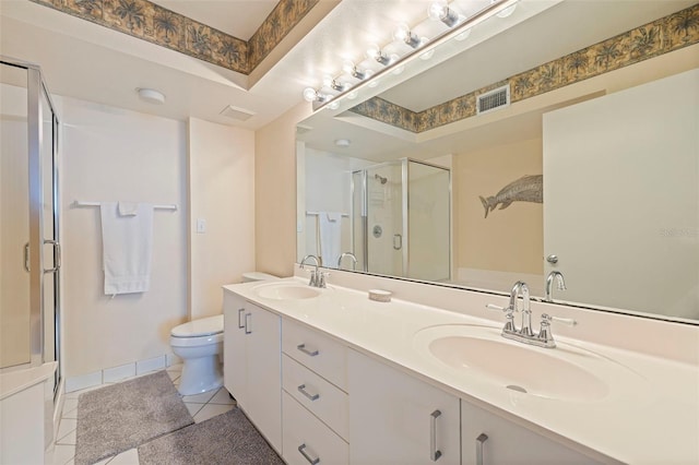 6105 Bahia Del Mar Cir Unit 683, Saint Petersburg, FL 33715 - full bath featuring a stall shower, tile patterned floors, toilet, and double vanity