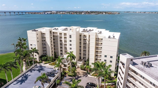 6105 Bahia Del Mar Cir Unit 683, Saint Petersburg, FL 33715 - bird's eye view of apartment complex, a nearby body of water, and a notable bridge