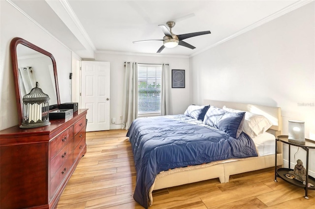 2969 Bonaventure Cir Unit 104, Palm Harbor, FL 34684 - bedroom featuring light wood-type flooring, ornamental molding, and a ceiling fan