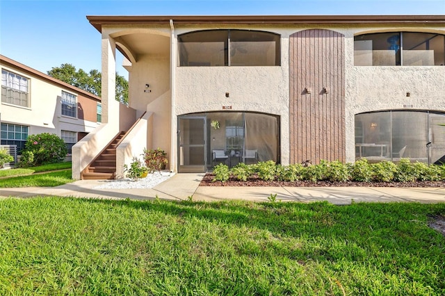 2969 Bonaventure Cir Unit 104, Palm Harbor, FL 34684 - view of building exterior with stairs